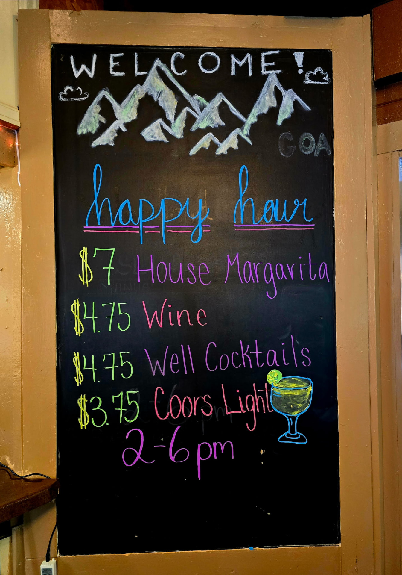 Vista Lounge happy hour chalkboard — $7 margaritas, $4.75 wine and cocktails